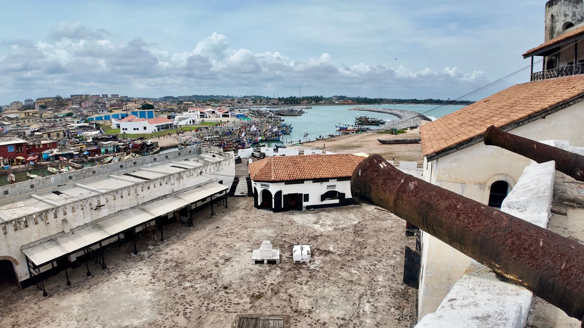 Cape Coast Castle at sunset with family