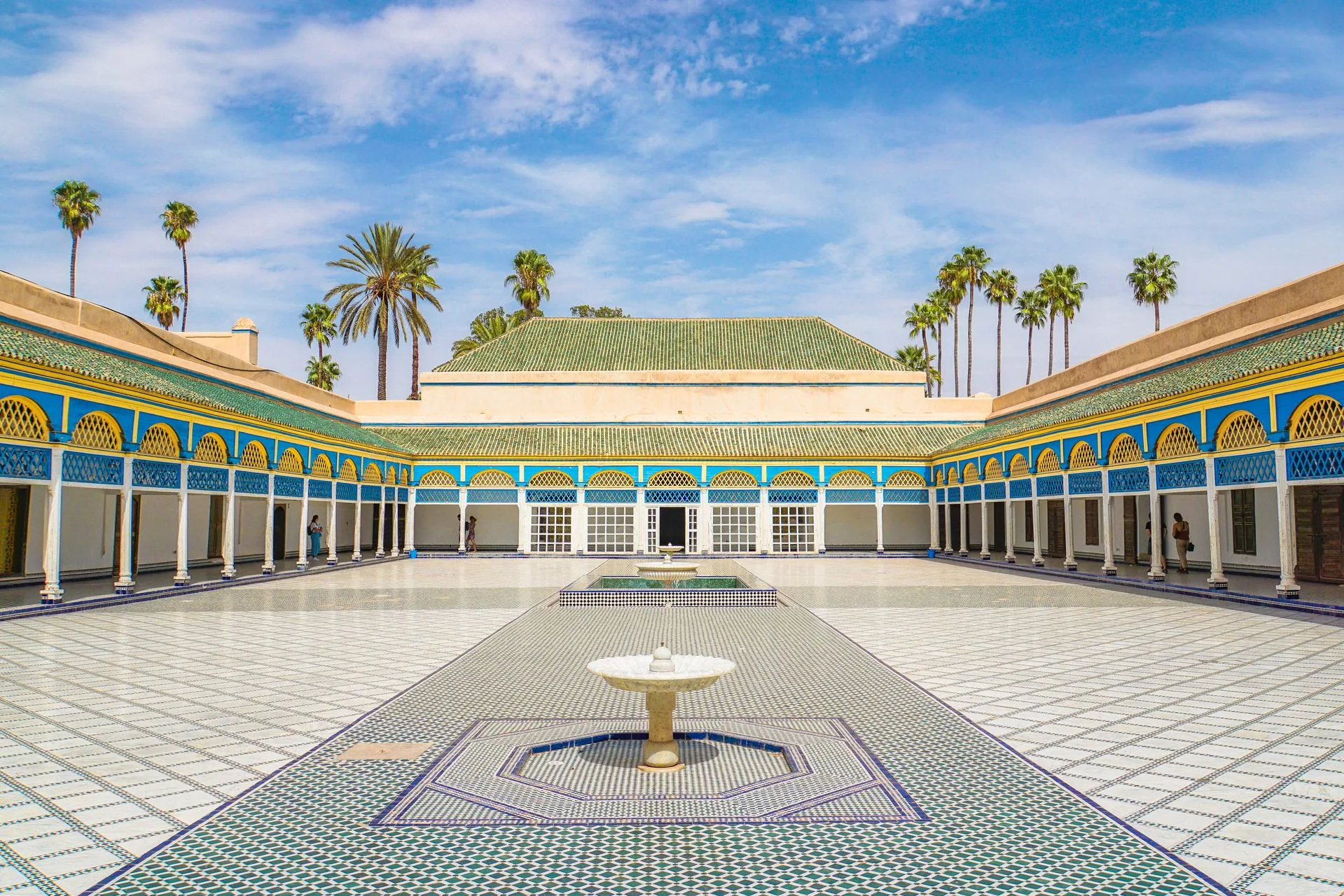 Bahia Palace architecture and vibrant Jemaa el-Fnaa square in Marrakech on Day 10 of Morocco Family Tour