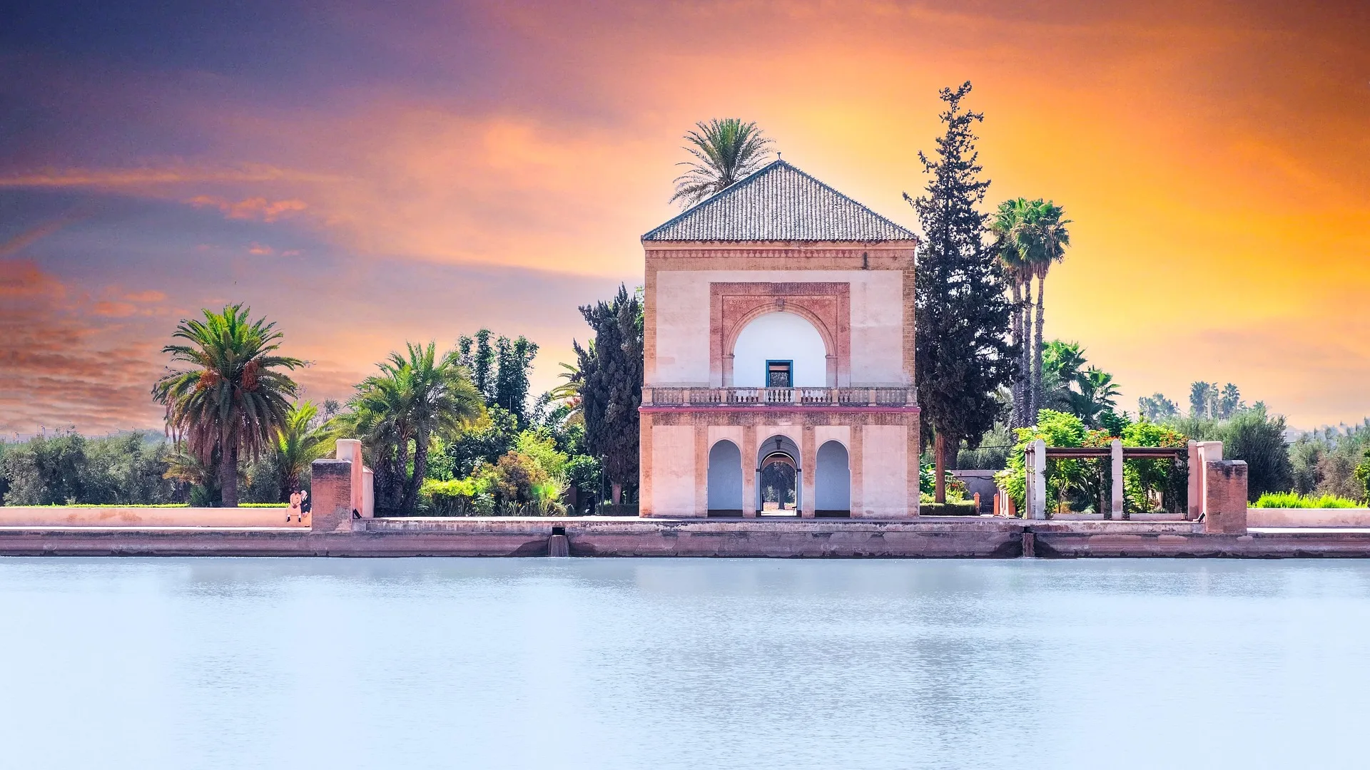 Menara Gardens olive groves and historic pavilion in Marrakech on Day 11 of Morocco Family Tour