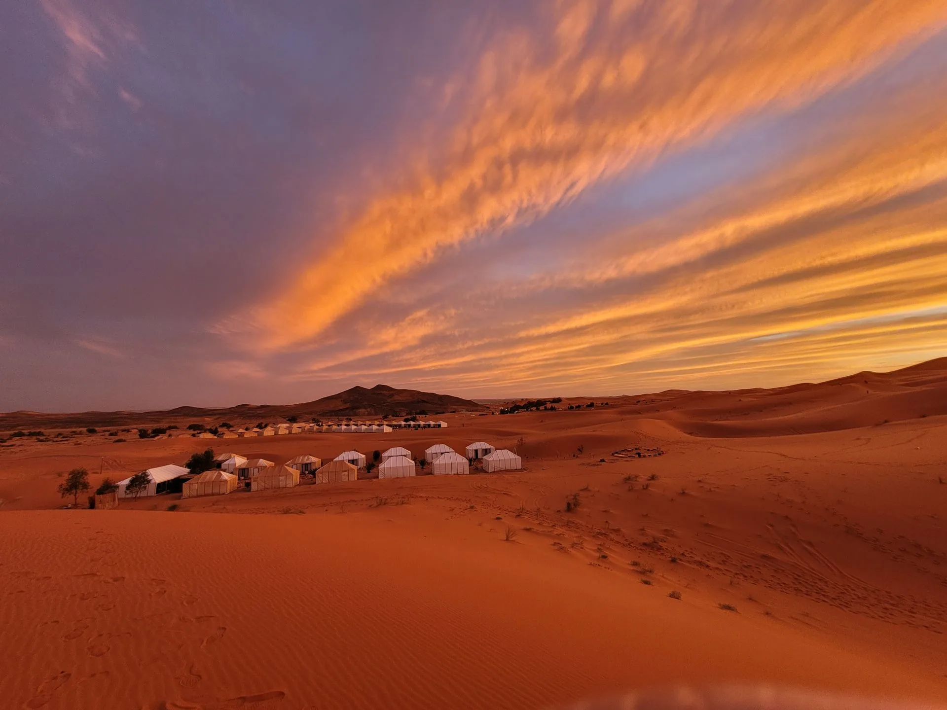 Camel trek and traditional Berber desert camp under starlit sky on Day 7 of Morocco Family Tour