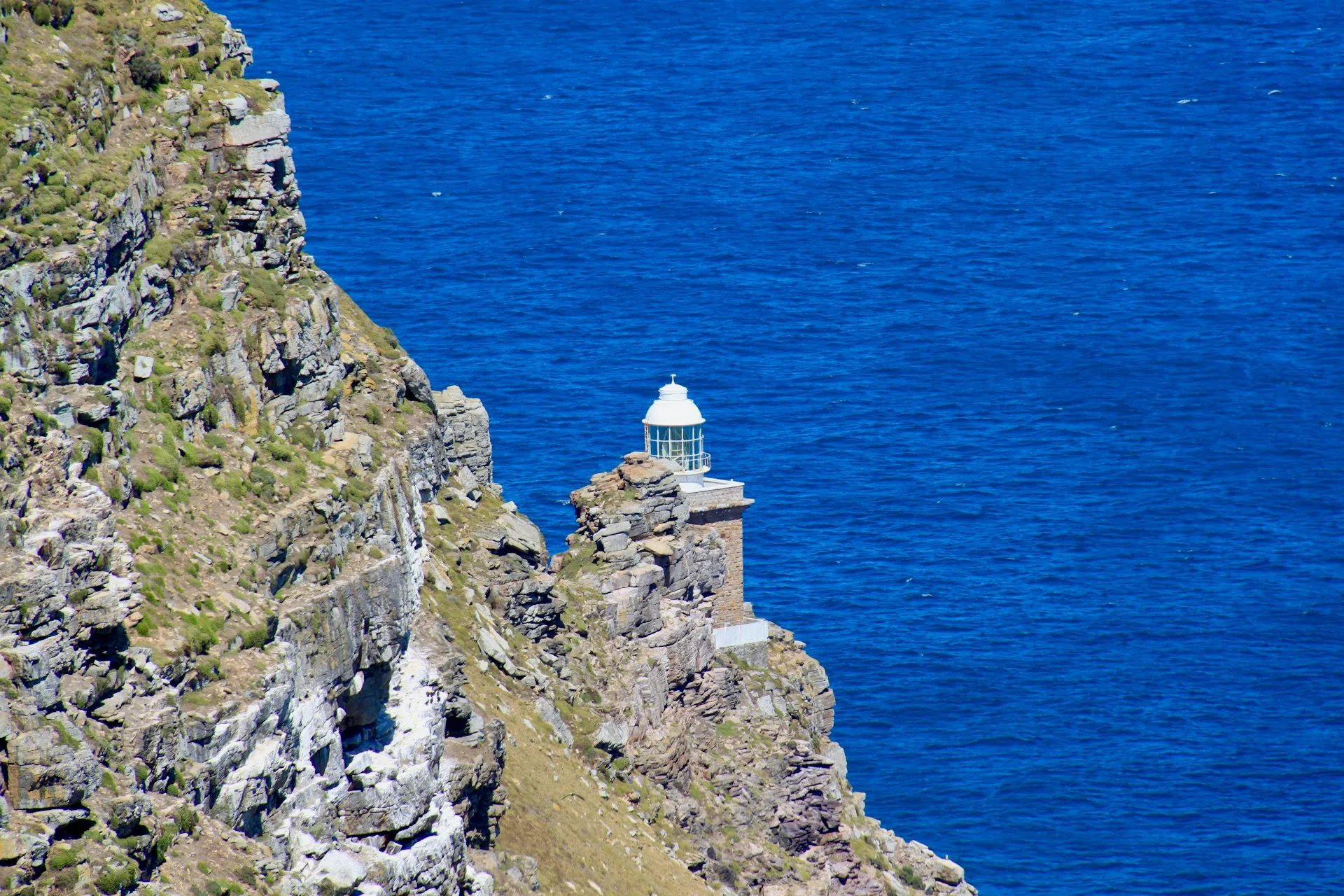 Cape Point lighthouse with dramatic cliffs and ocean views - Day 3 of South Africa Family Tour