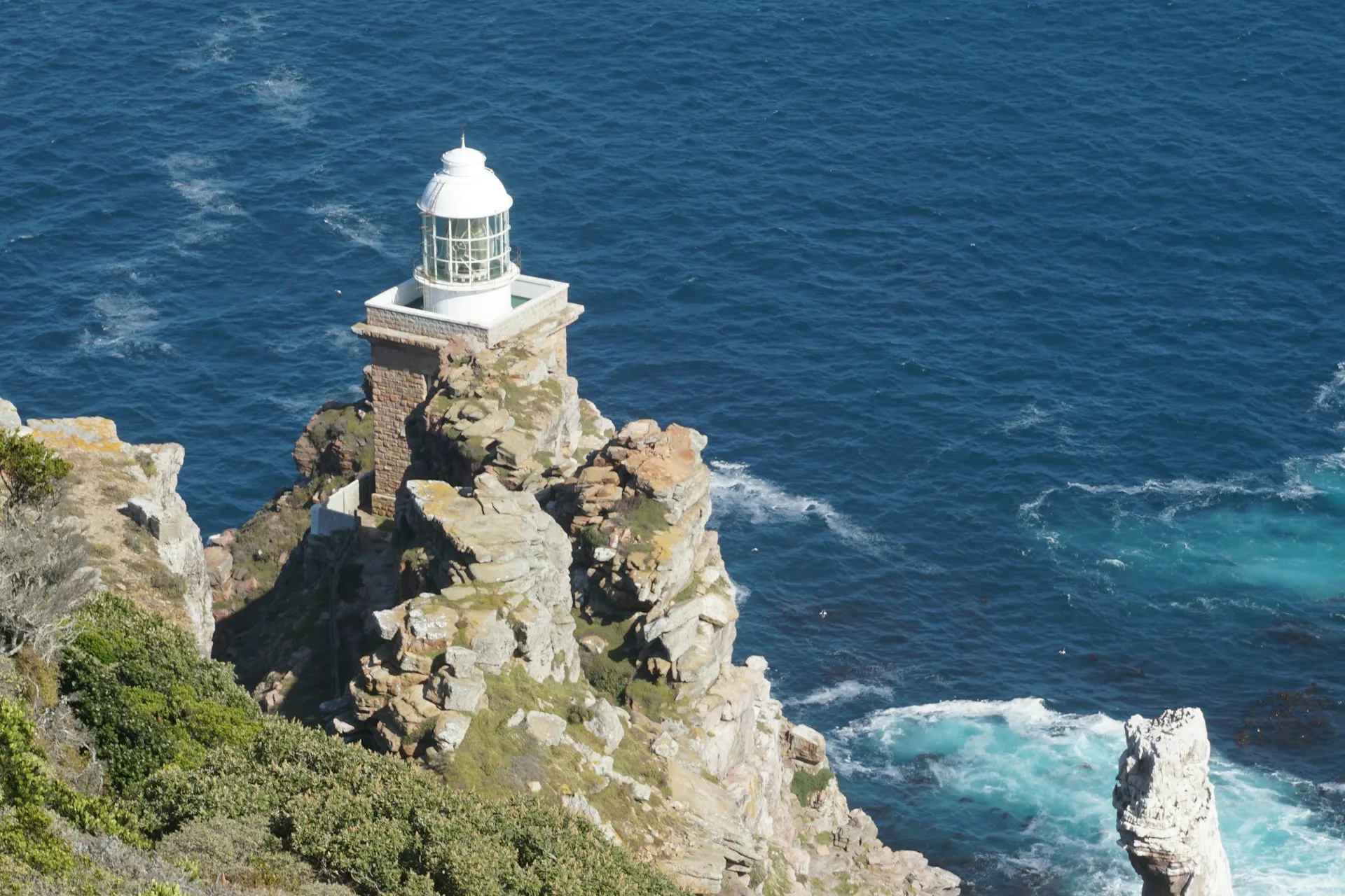 Cape Point lighthouse with dramatic cliffs and ocean views