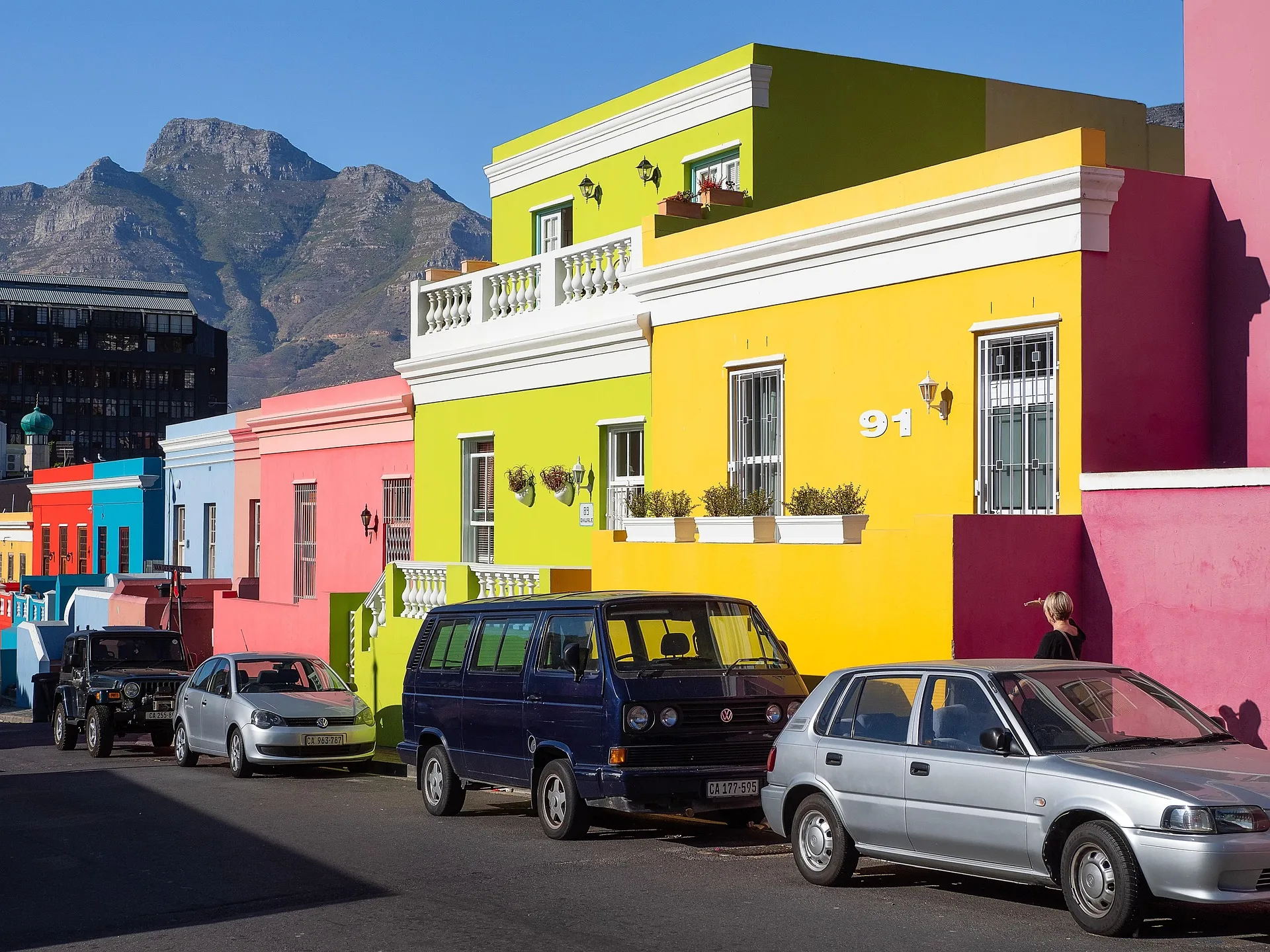 Colorful houses in Bo-Kaap neighborhood with Table Mountain background