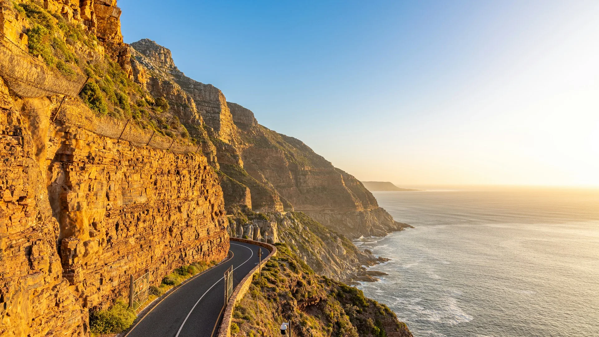 Chapman's Peak coastal road winding along cliffs above ocean