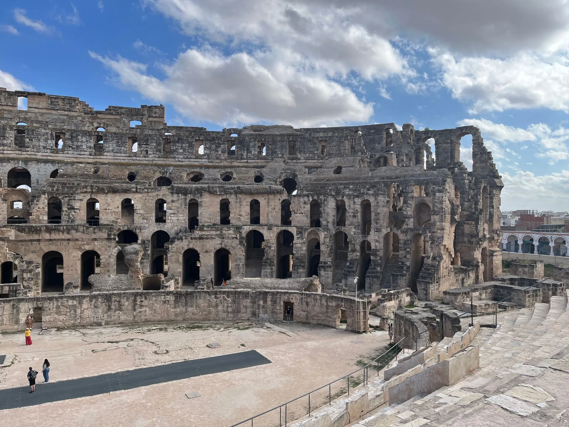 Massive Roman amphitheater at El Djem with dramatic architecture