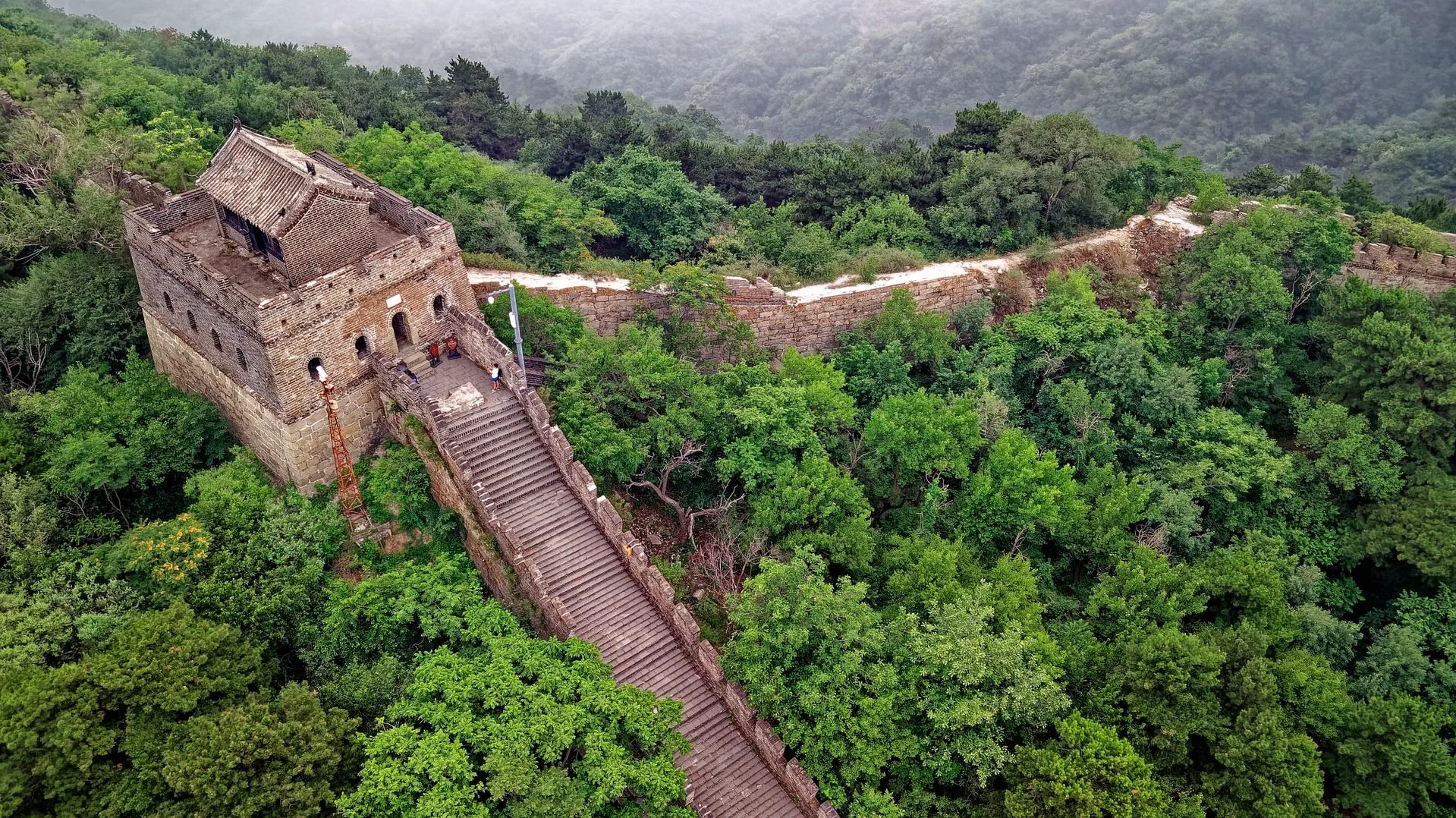 Great Wall watchtowers with mountain backdrop