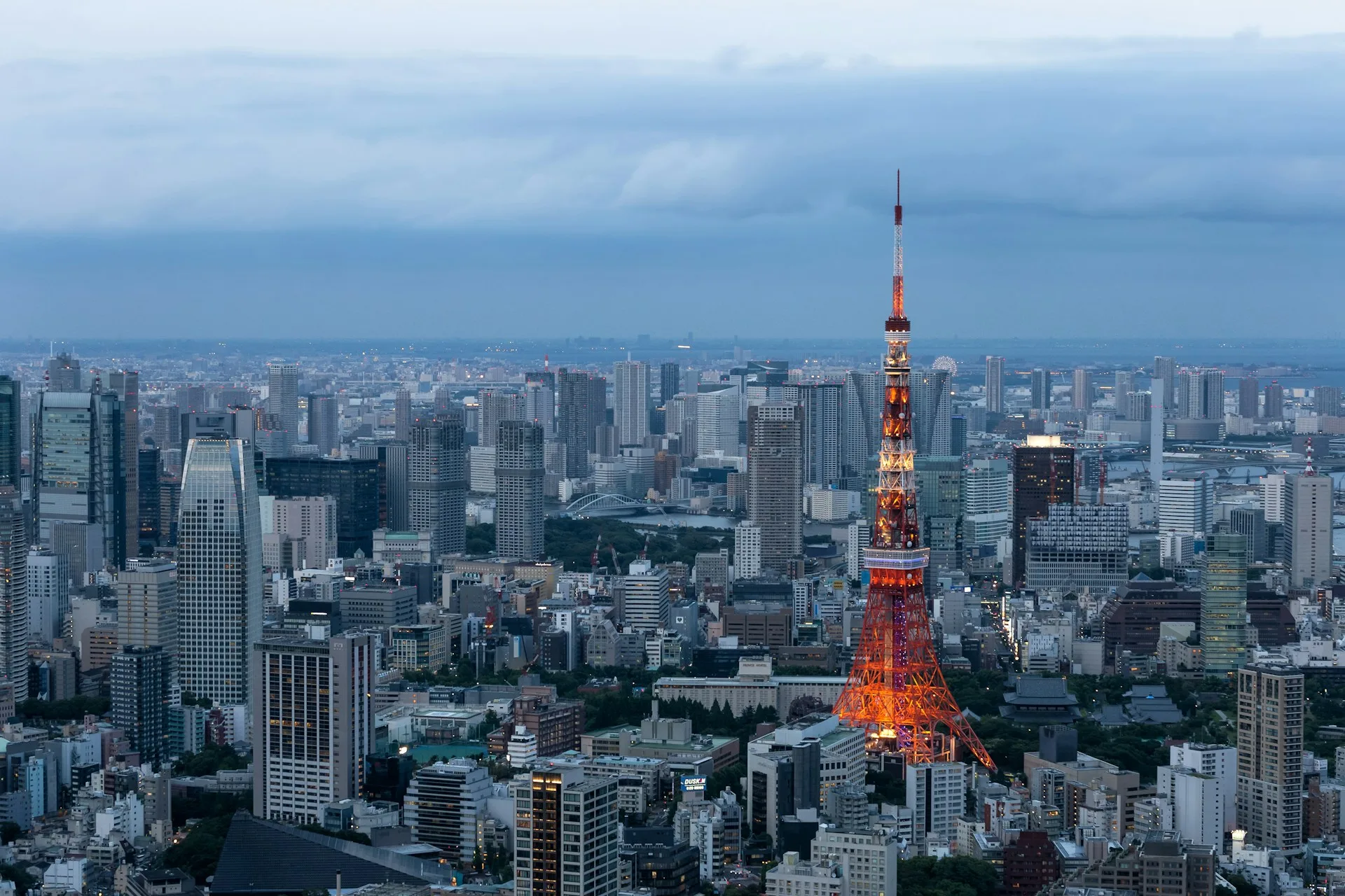 Tokyo Skytree illuminated at evening from Sumida River