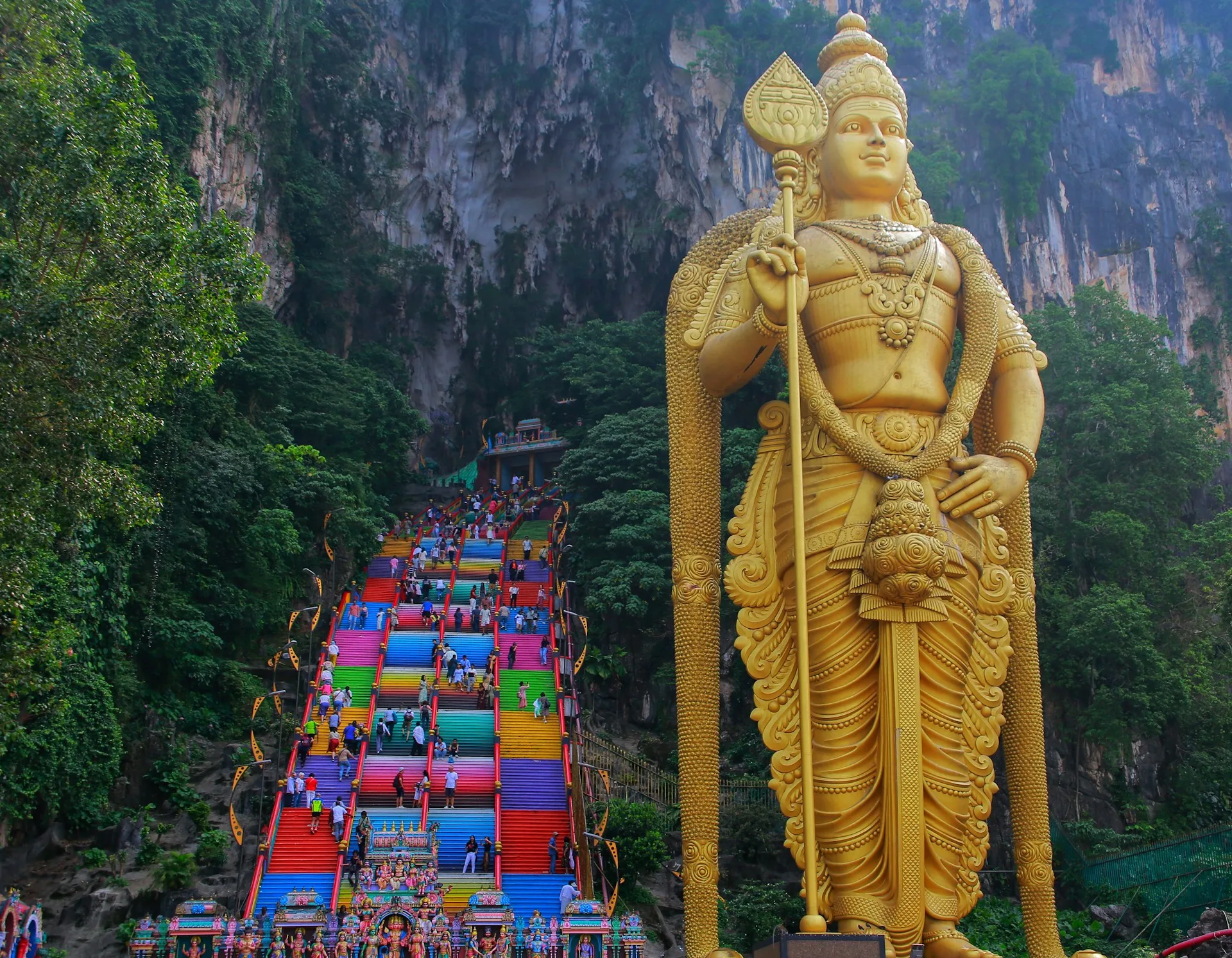 Batu Caves rainbow stairs and golden statue photography