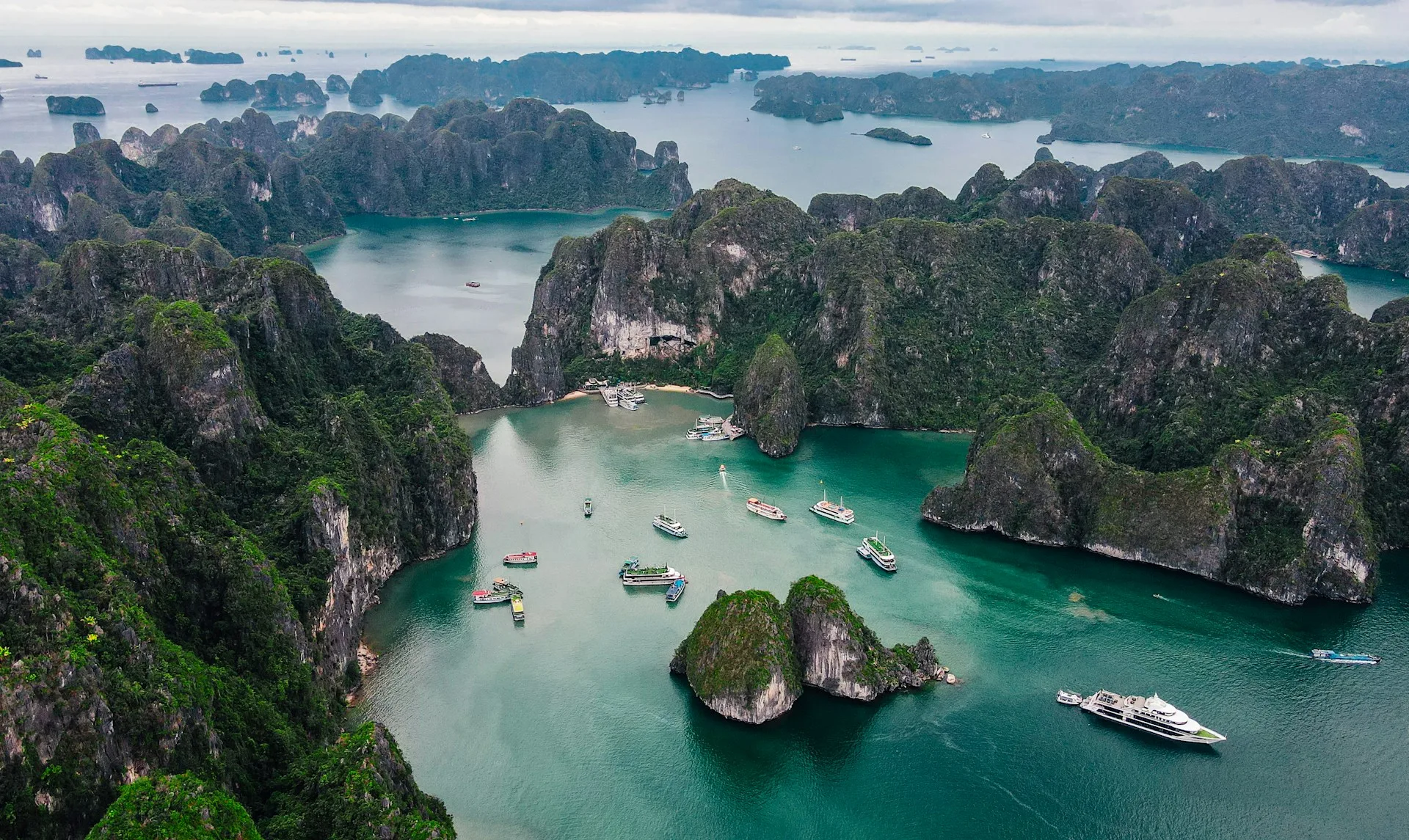 Ha Long Bay sunrise with limestone karsts