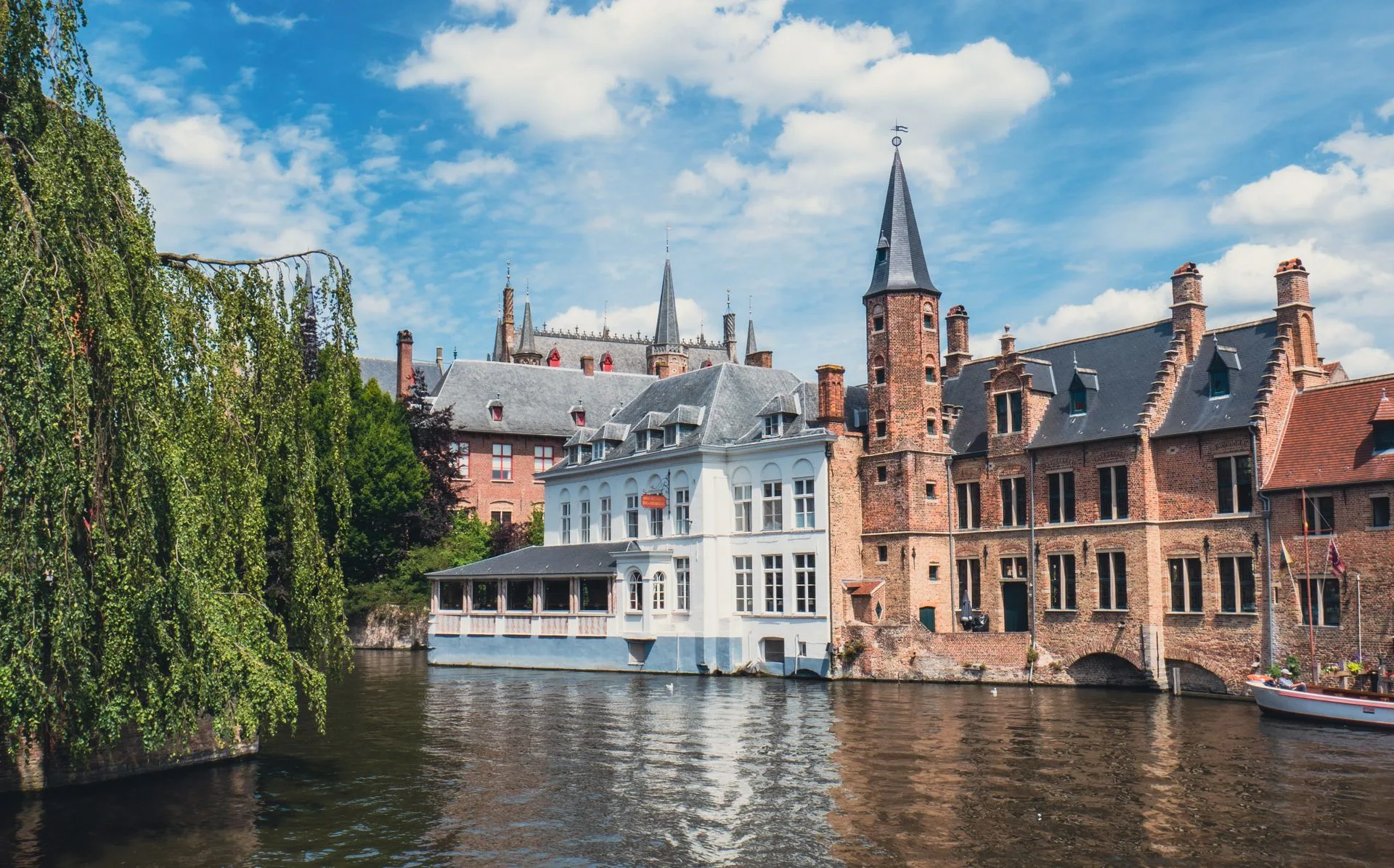 Bruges canal view from Rozenhoedkaai with Belfry tower reflection