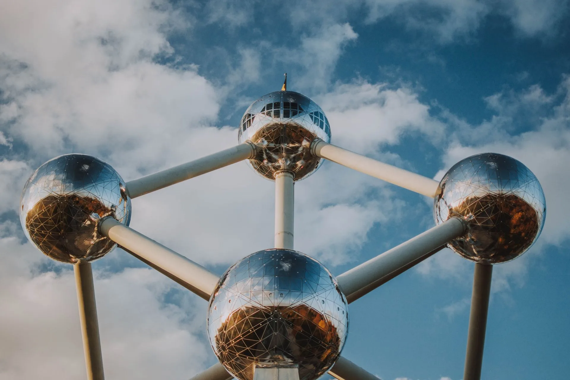 Atomium Brussels at sunset with glowing steel spheres