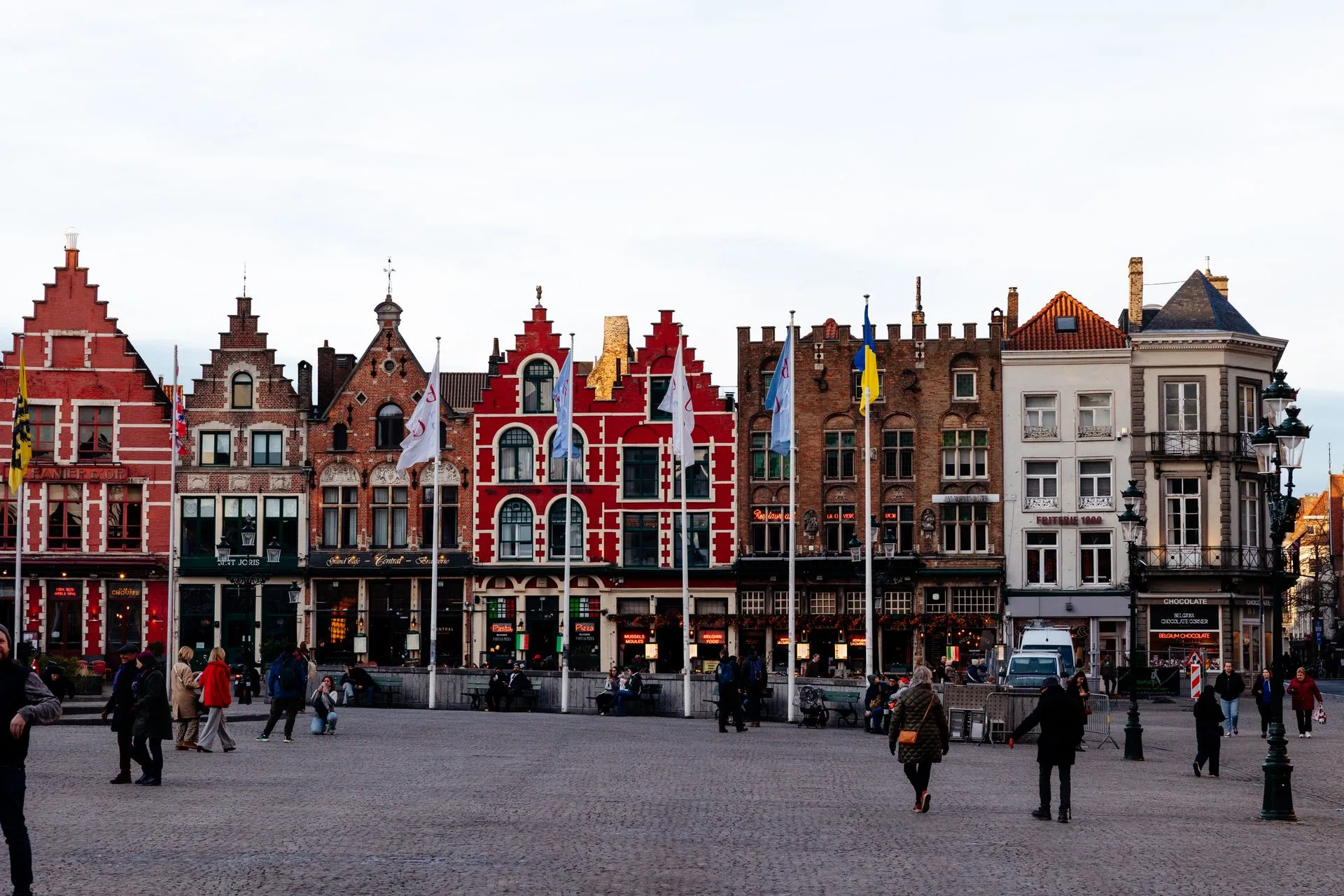 Bruges Markt square illuminated at night with Belfry tower