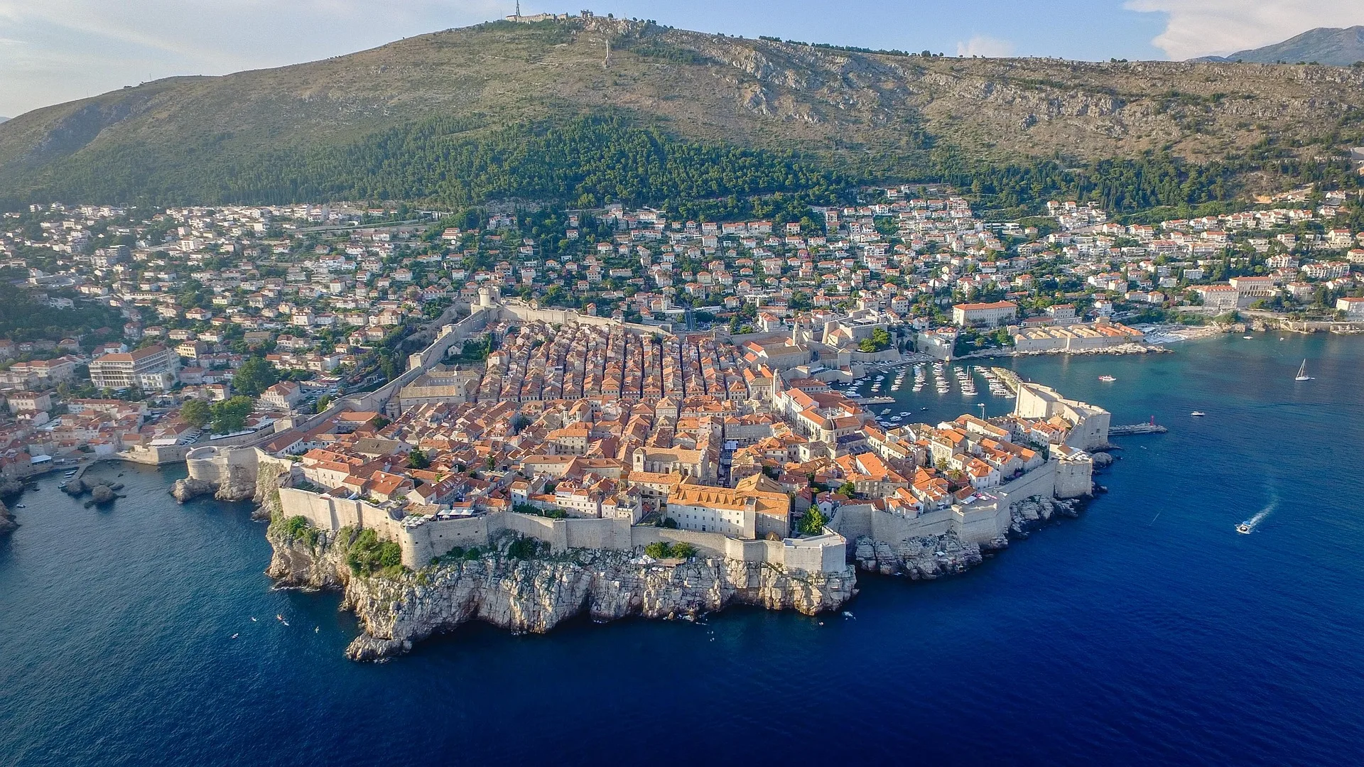 Dubrovnik city walls overlooking old town rooftops and Adriatic Sea