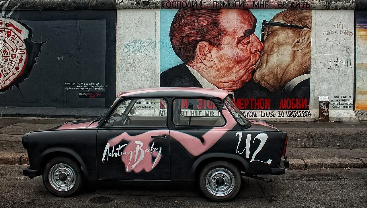 East Side Gallery Berlin Wall with family and street art