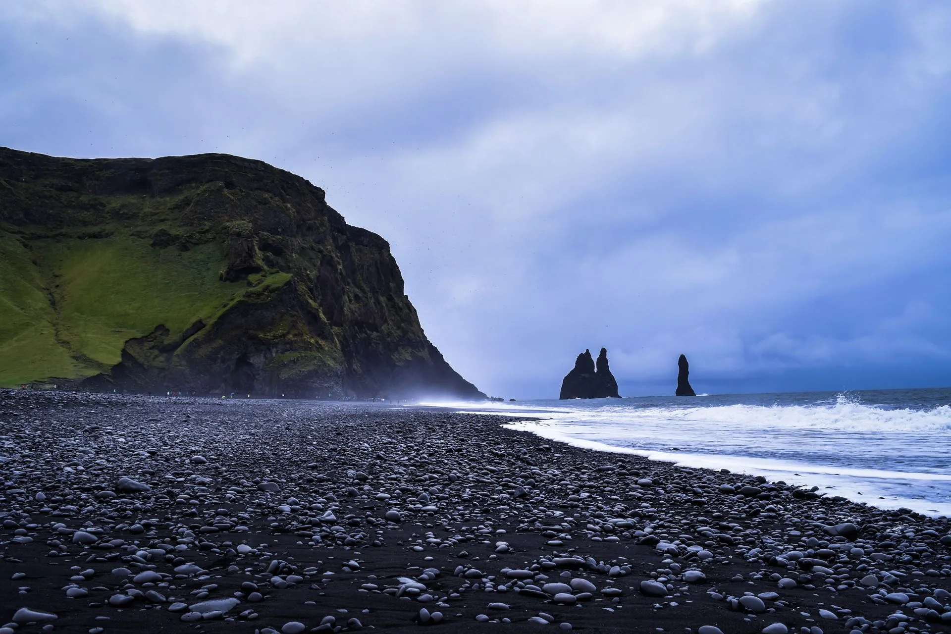 Reynisfjara black sand beach with basalt columns Iceland