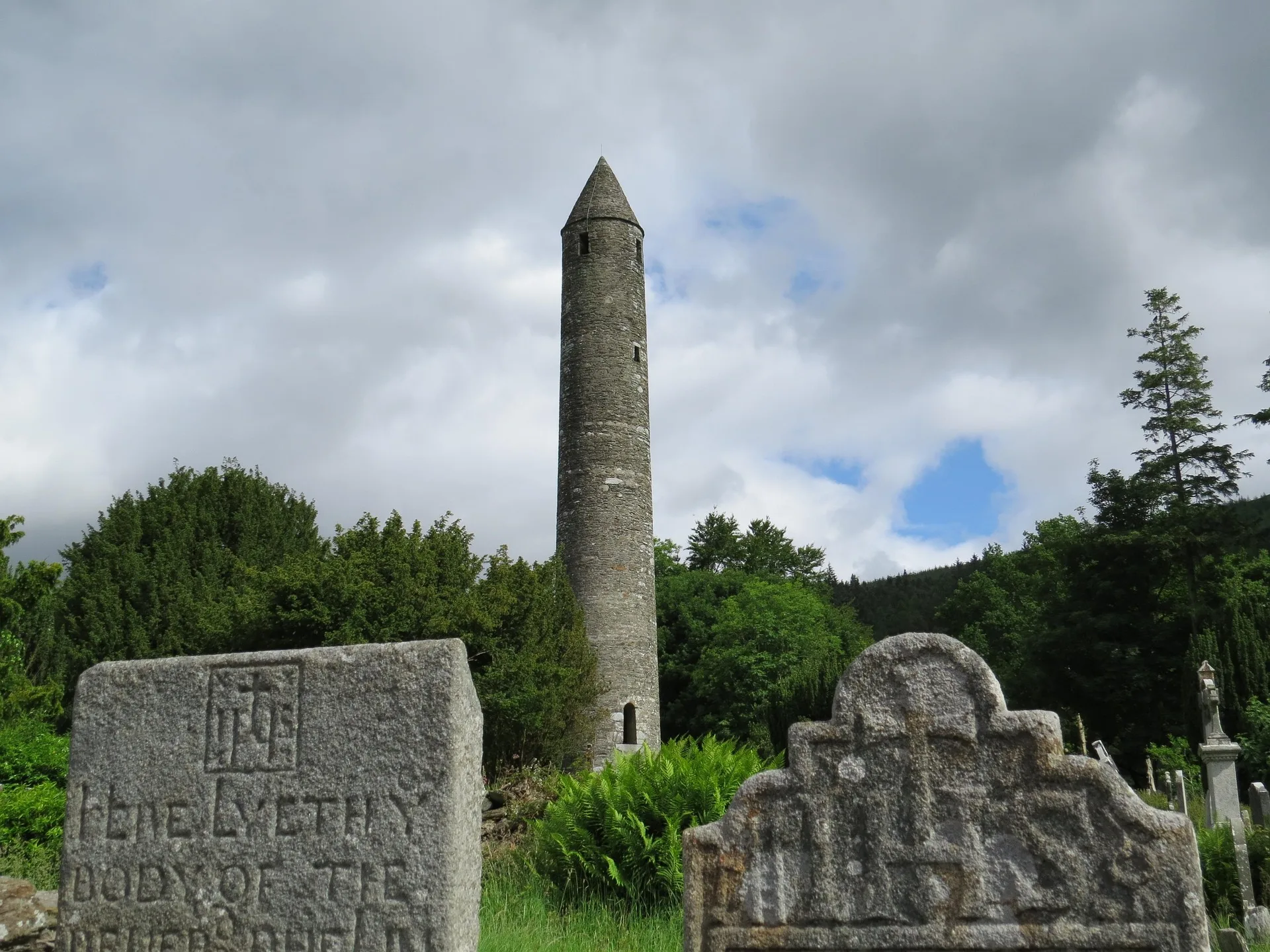 Glendalough round tower and lake