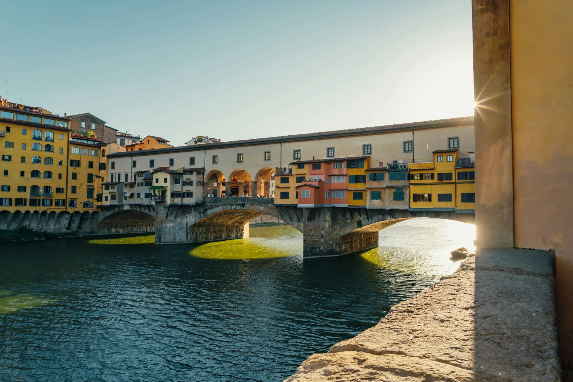 Ponte Vecchio reflected in the Arno River