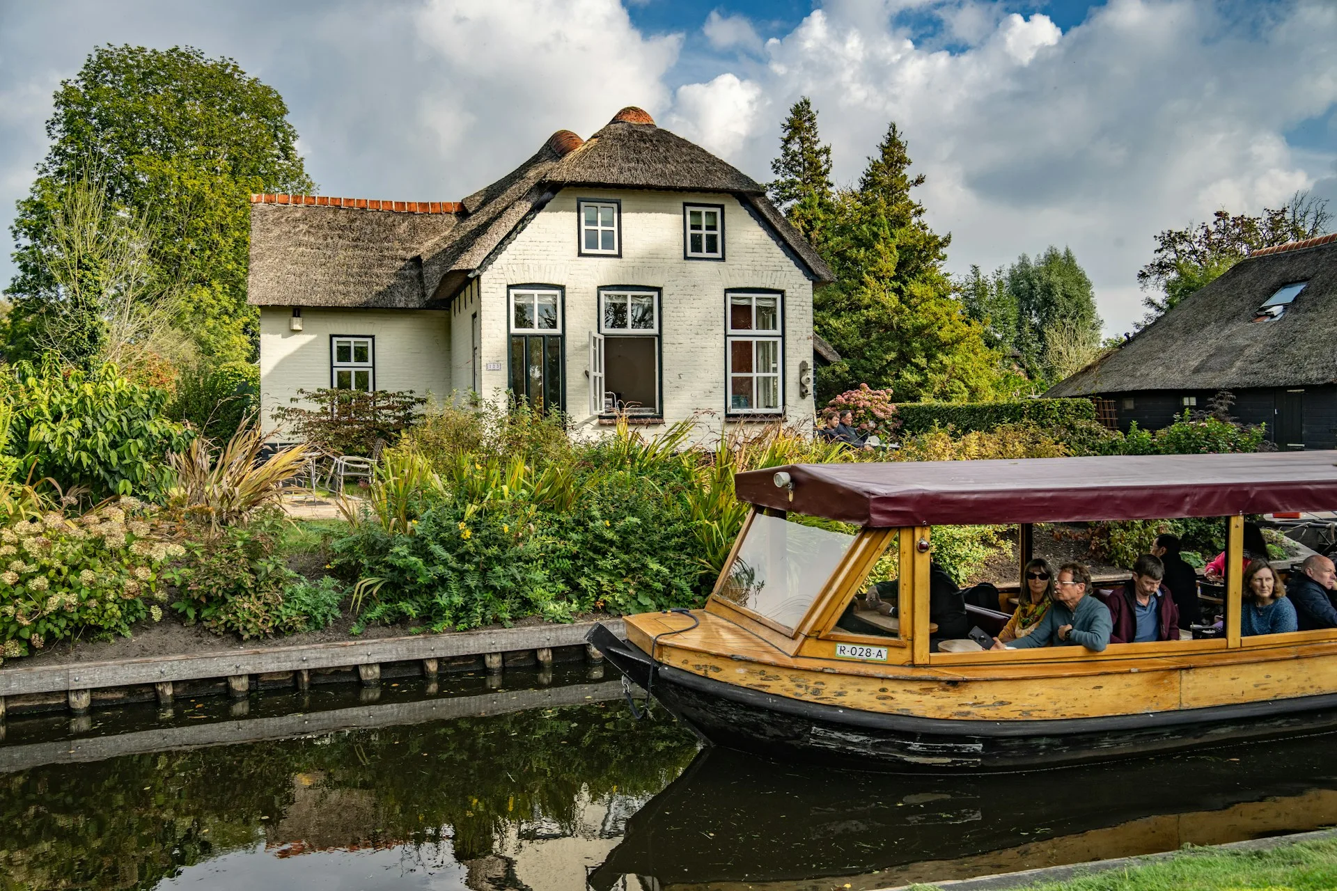 Giethoorn village canals and whisper boats - Day 5 of Netherlands Family Tour Package
