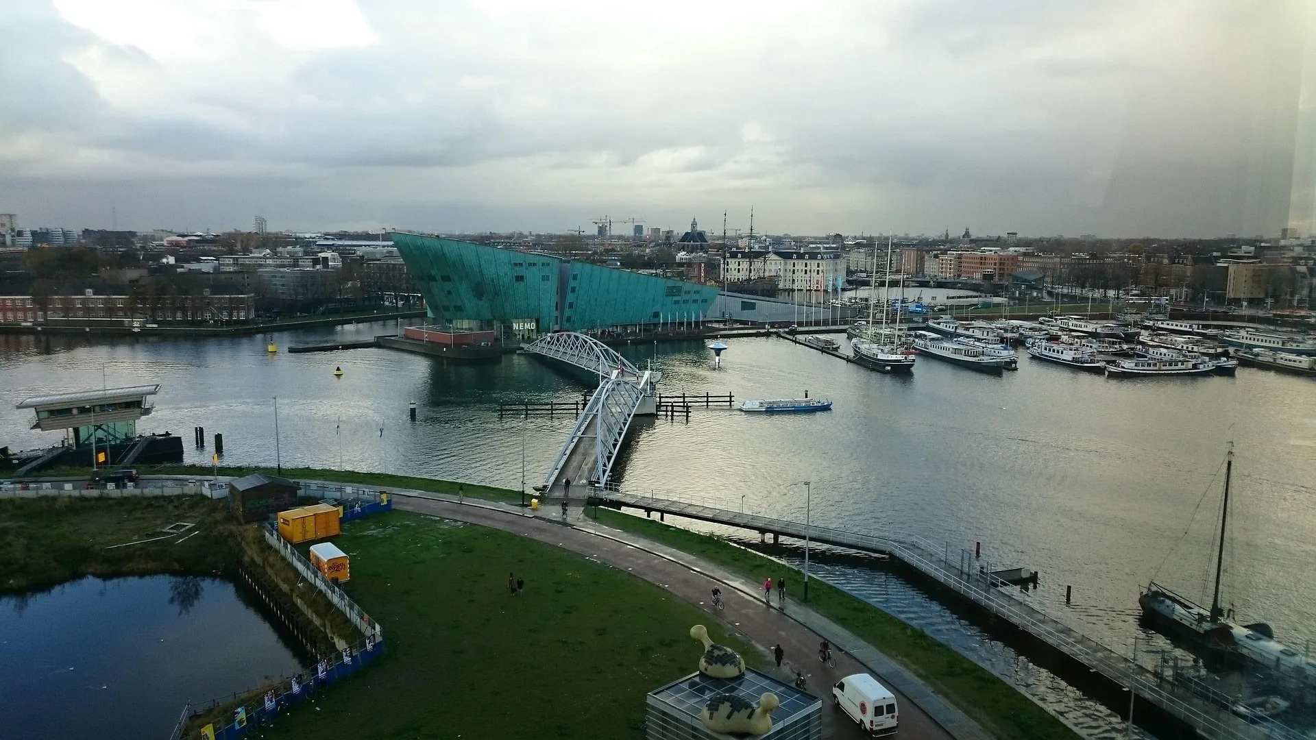 Panoramic Amsterdam cityscape view from NEMO museum rooftop