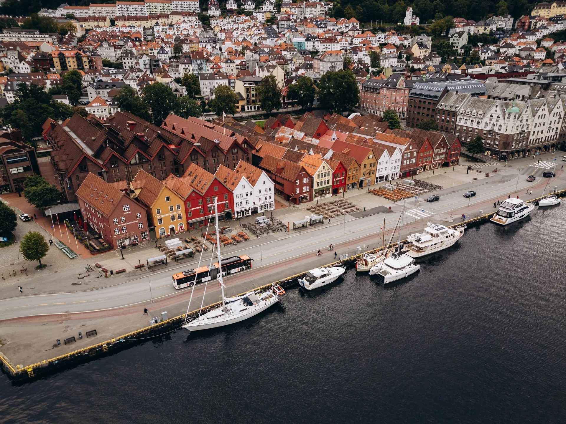 Bryggen Wharf colorful buildings reflection in Bergen harbor