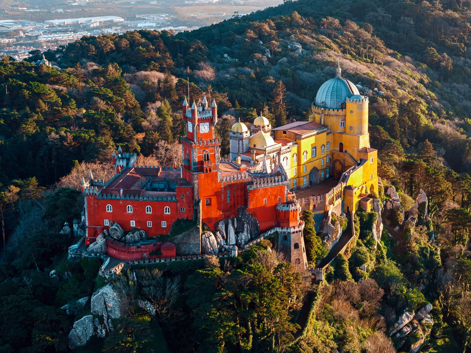 Colorful Pena Palace in Sintra surrounded by lush gardens