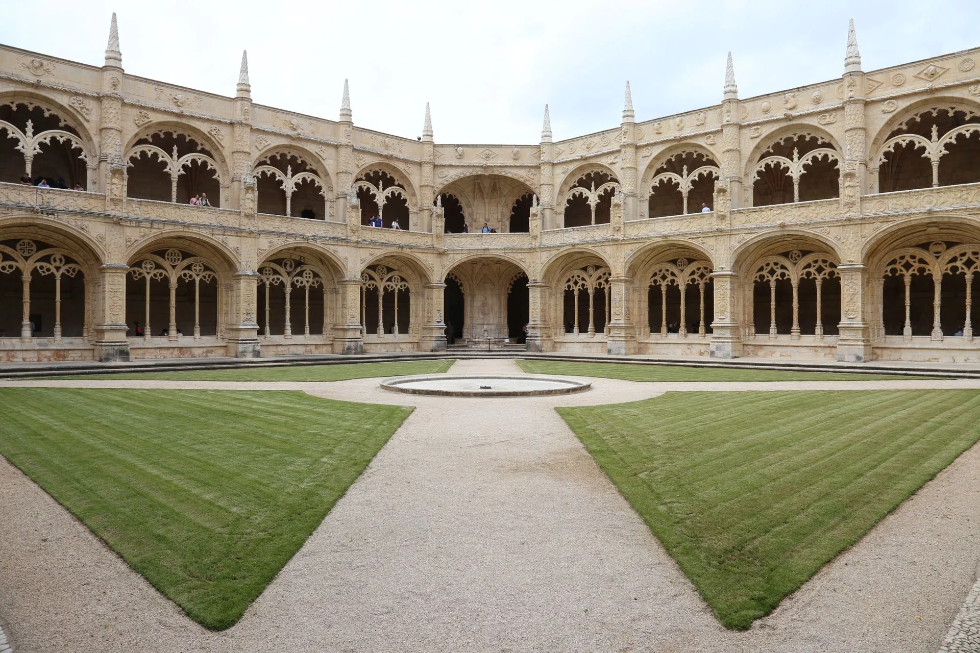 Ornate Manueline cloisters at Jerónimos Monastery with detailed stone carvings