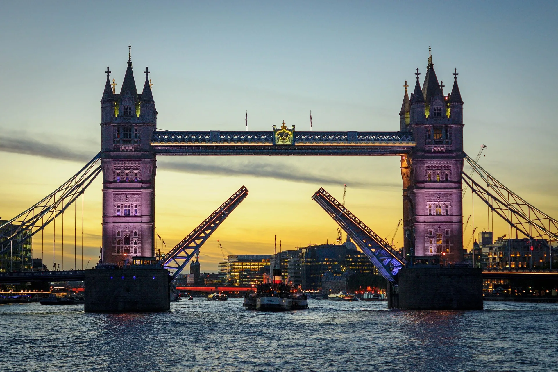 Tower Bridge at sunset with reflection in Thames River