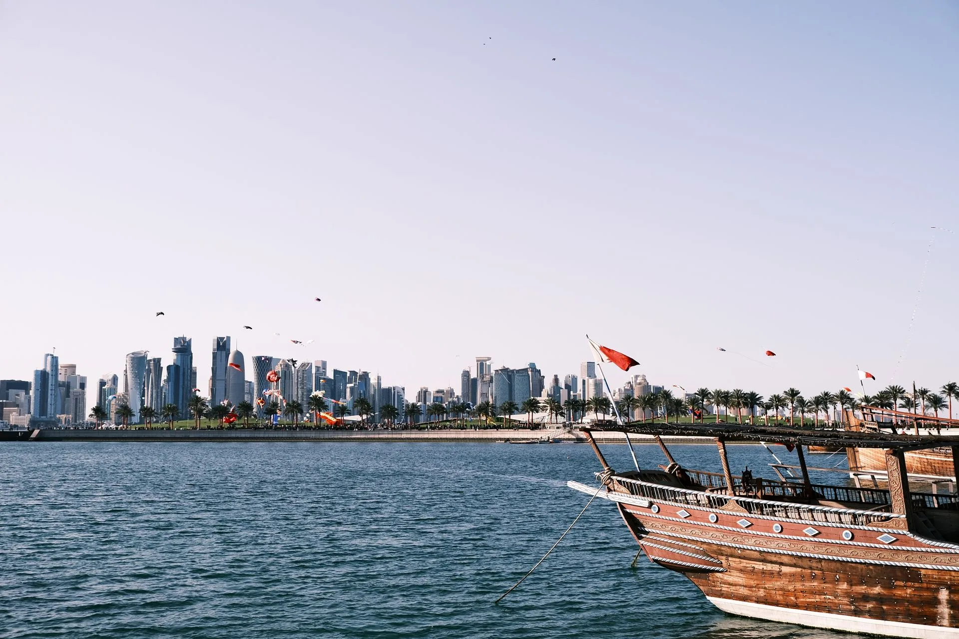 Doha Corniche waterfront and West Bay skyline at sunset - Day 1 Arrival in Qatar Family Tour Package