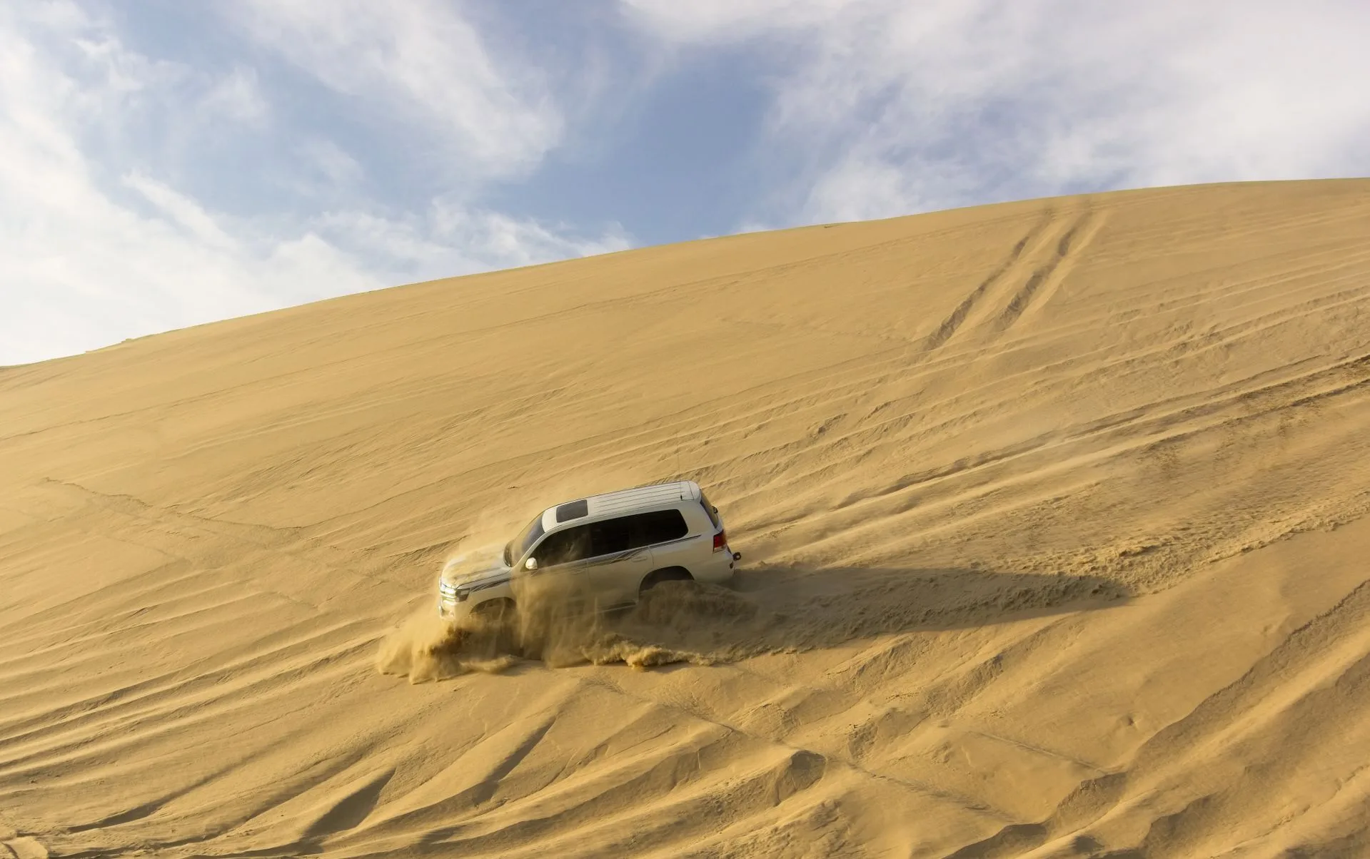 Desert safari dune bashing and Inland Sea on Day 3 of Qatar Family Tour