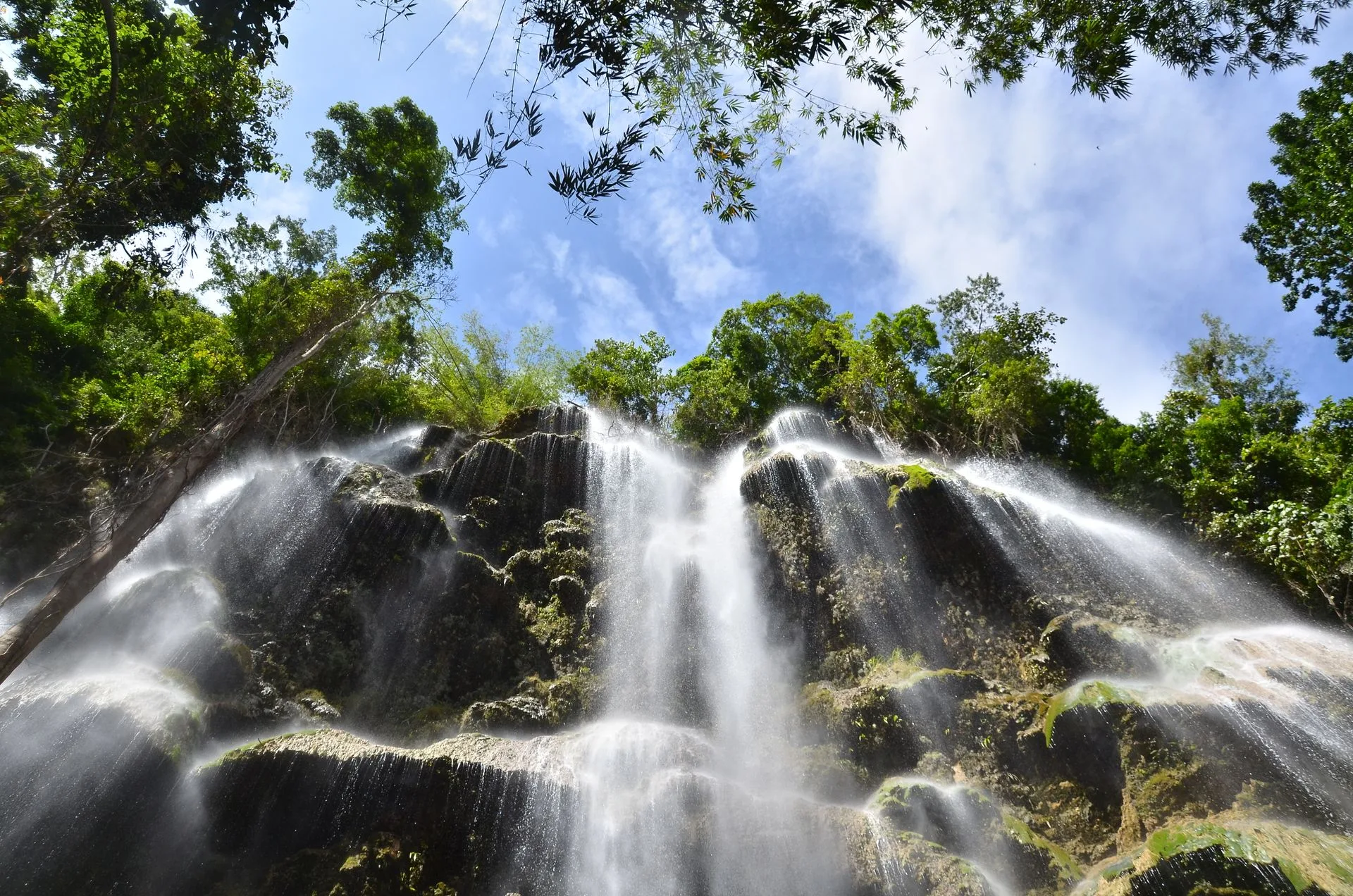 El Limón Waterfall cascading into natural pool surrounded by rainforest