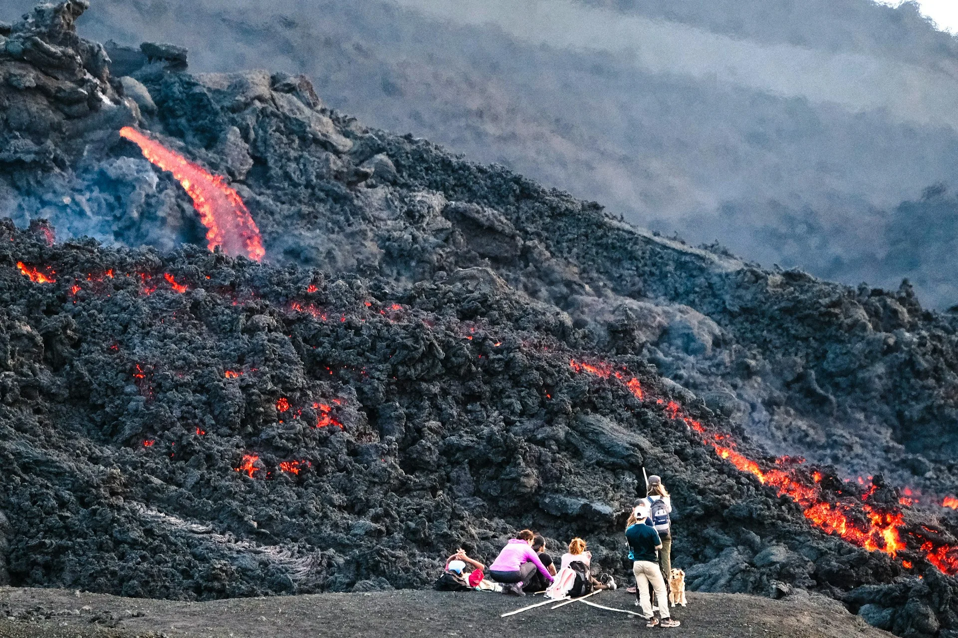 Family hiking adventure on Pacaya Volcano with lava fields and steam vents - Day 3 of Guatemala Family Tour Package
