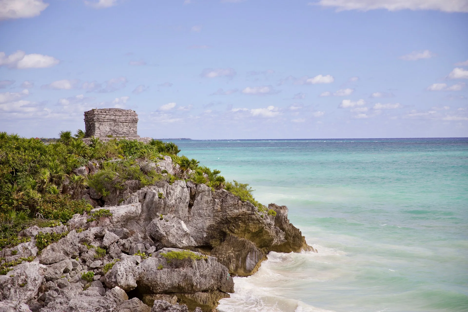 Tulum ruins on cliff overlooking Caribbean Sea