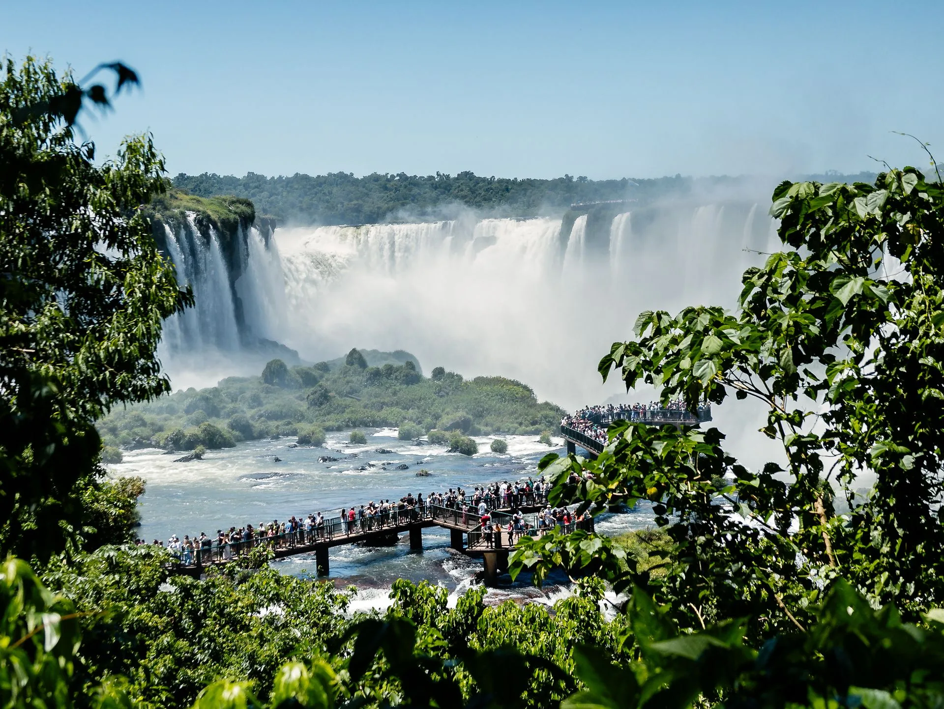 Devil's Throat at Iguazu Falls - massive horseshoe waterfall with mist and rainbow in Argentina