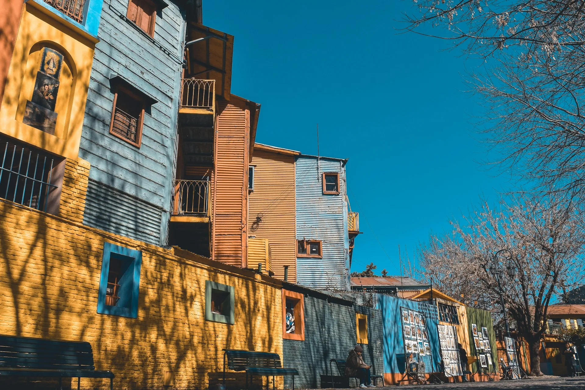 Colorful Caminito street in La Boca Buenos Aires - vibrant painted houses and cobblestone walkway