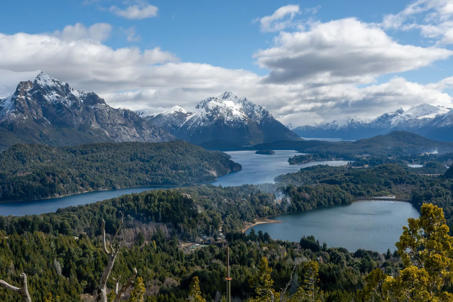 Panoramic view from Cerro Campanario summit near Bariloche - emerald lakes and snow-capped Andes peaks in Patagonia