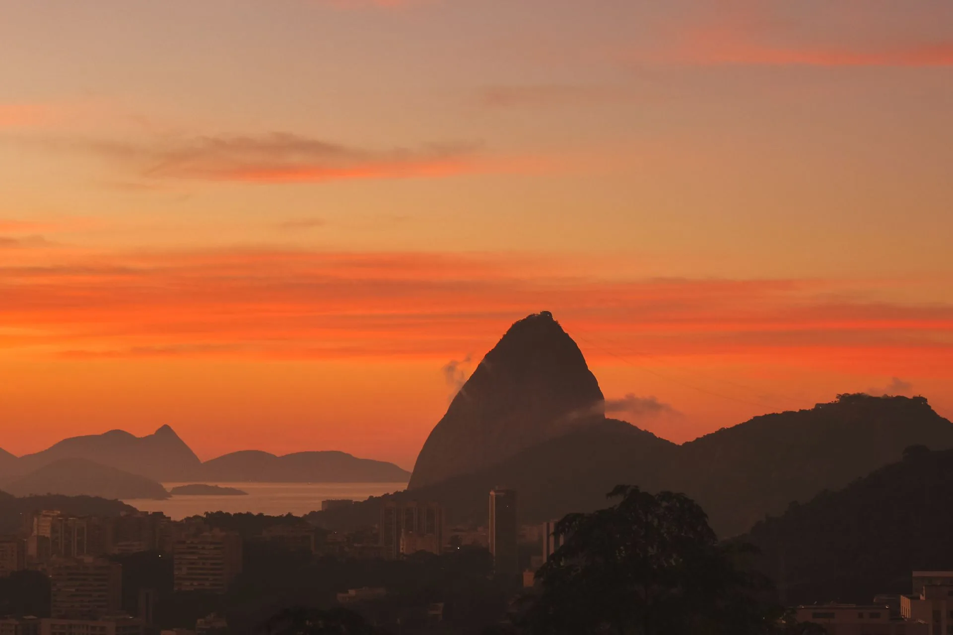 Sugarloaf Mountain cable car at sunset over Rio de Janeiro
