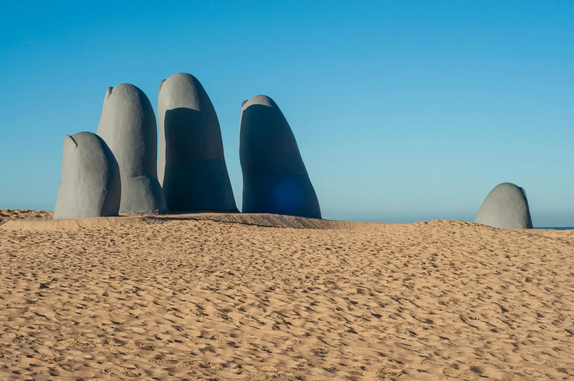 Iconic La Mano sculpture and beautiful beaches in Punta del Este on Day 6 of Uruguay Family Tour