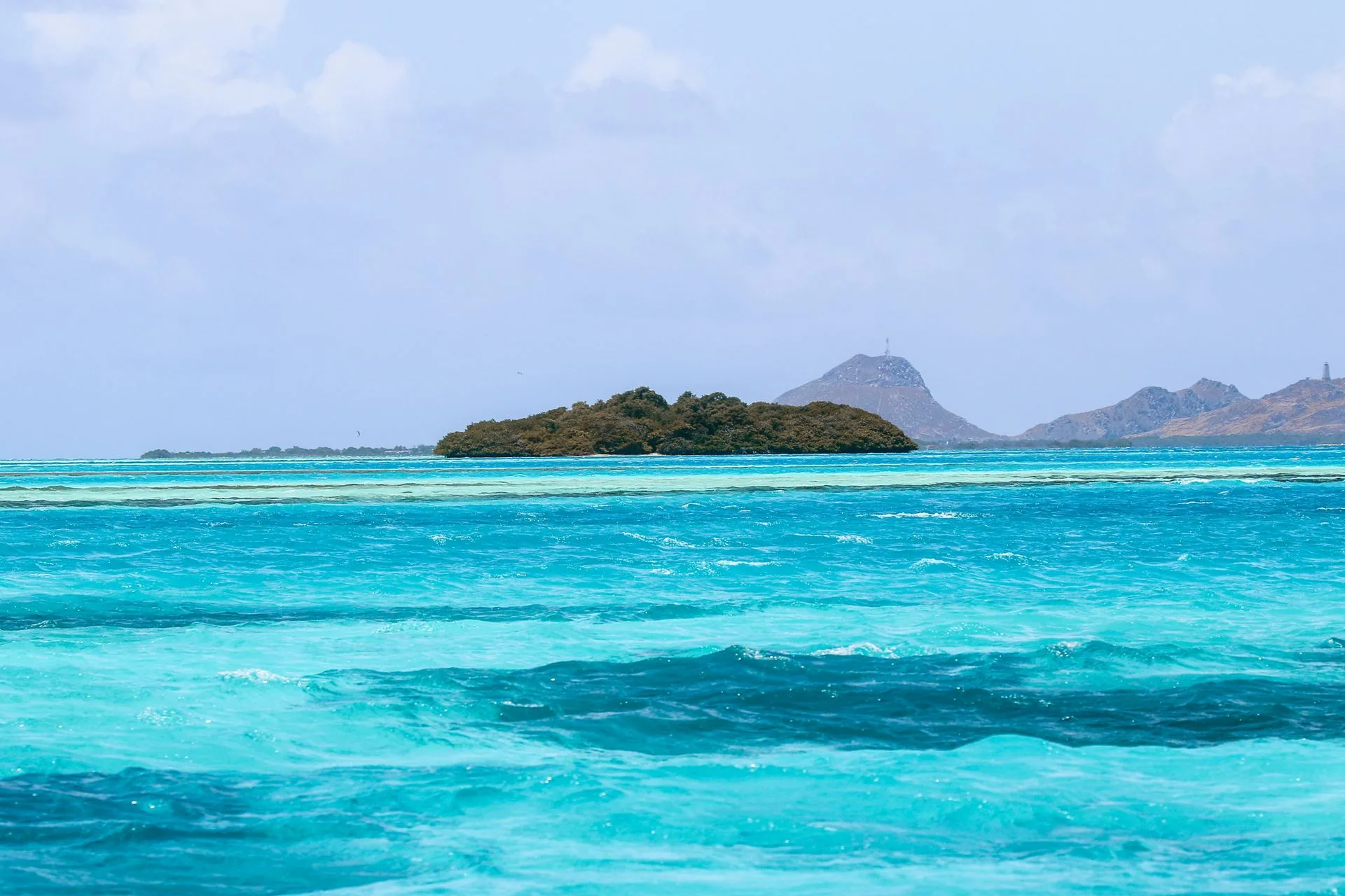 Aerial view of Los Roques archipelago showing turquoise waters and white sand cays